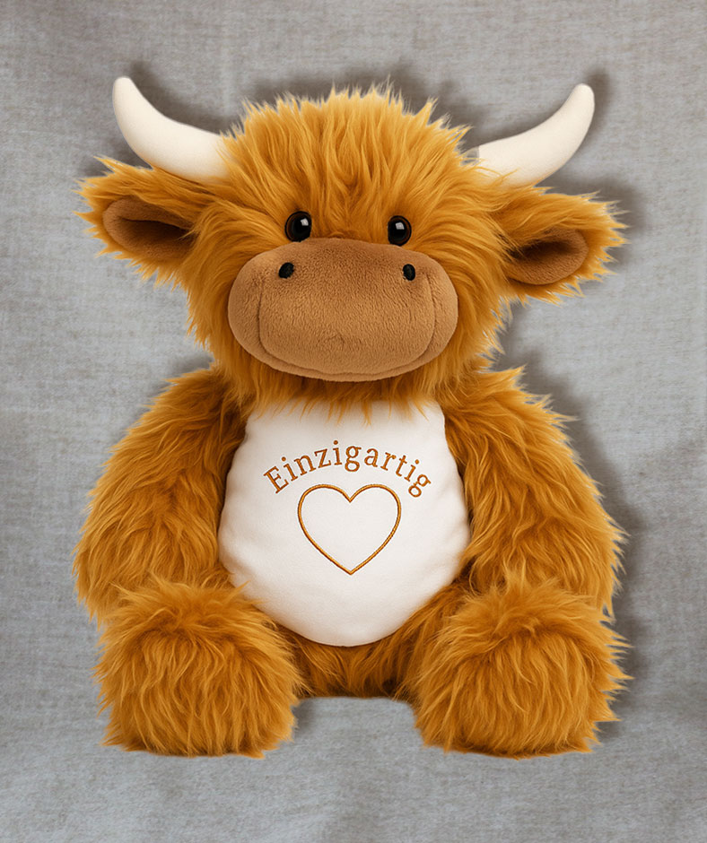 Verschiedene bestickte Kuscheltiere.